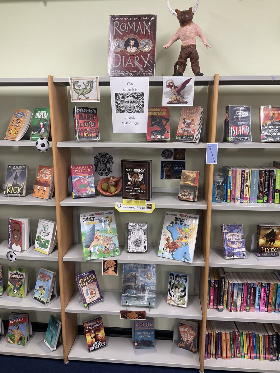 ClassicsCcs's tweet photo. Look at our lovely display of reading books inspired or based on Greek and Roman myths. Many thanks to our lovely librarian for organising this and Yr 7 for providing the wonderful decoration. https://t.co/jDv1WK4vK9