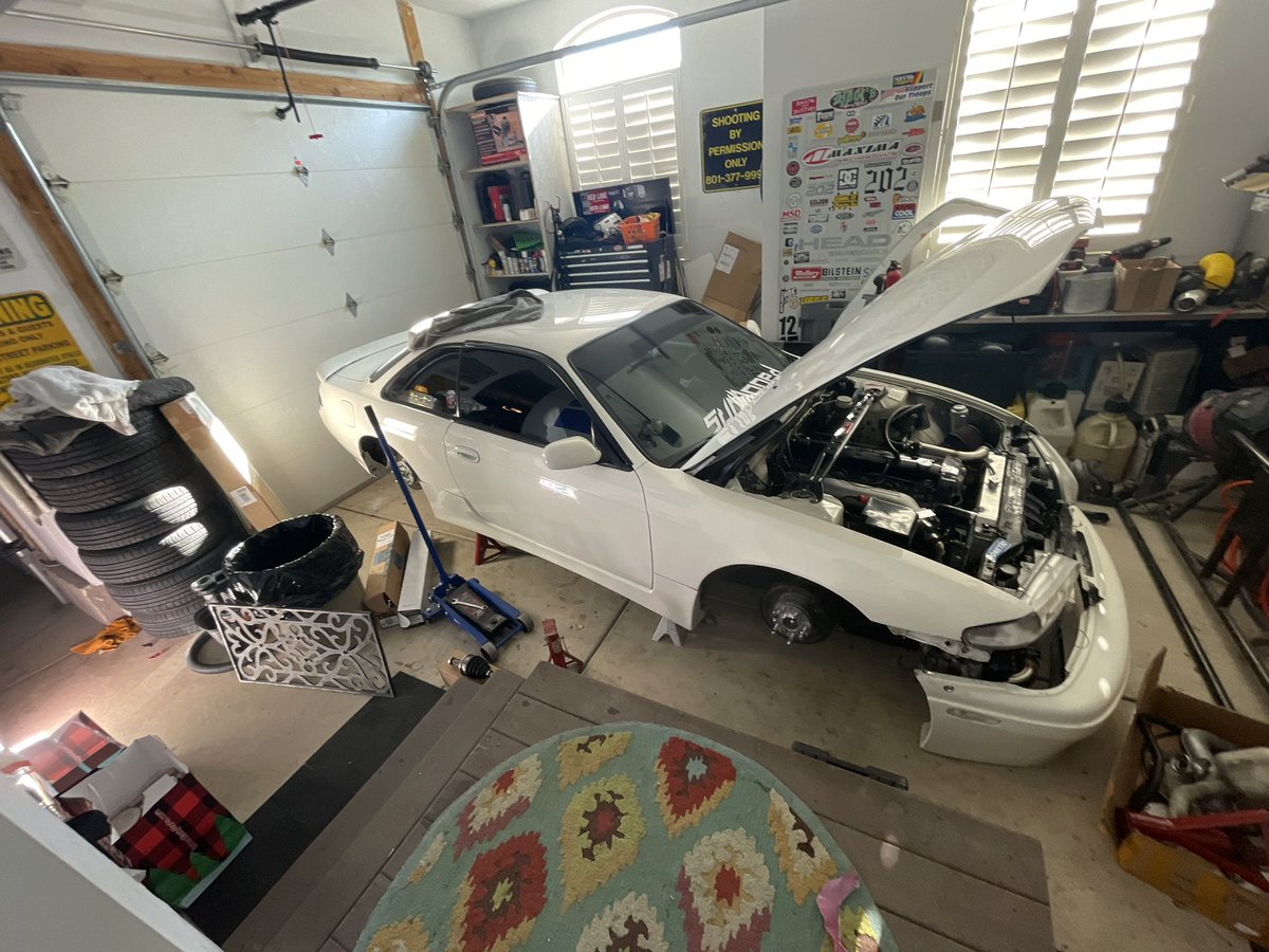MaxKelson1's tweet photo. The s14 is up on jack stands for the winter. Any guess as to what I could be doing?? Follow my other socials @ mrclean_s14 to see more! #s14 #kyoko #COMM3140 #UVUCOMM #jackstands #240sx https://t.co/oKyeBUwAc9