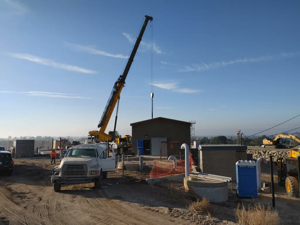 NLineEnergy's tweet image. 18,000 lb generator (six VW Beetles) being hoisted into place as part of @SBVMWD's 1 MW hydropower project to harness wasted energy into renewable power.