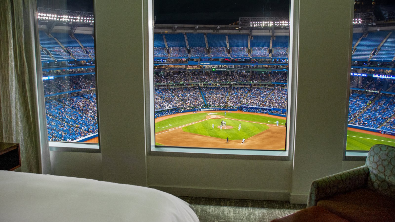 This hotel room has views of the Toronto Blue Jays' home field