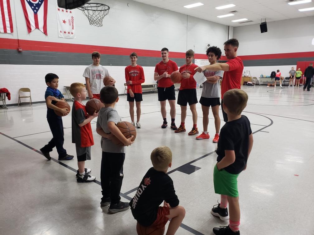 CoachFledd's tweet photo. School, practice, weights and a few of our varsity guys still found time to help out with one of our youth teams tonight.

@cam__waters @Haley_Hunter1 @Stroud04Hunter @gwhit2332 @caden_zeinner @CoachBaker_GHS @Goshen_Athletic @GoshenWarriors @GoshenLocal @MarrCook https://t.co/ELsOrEseWB