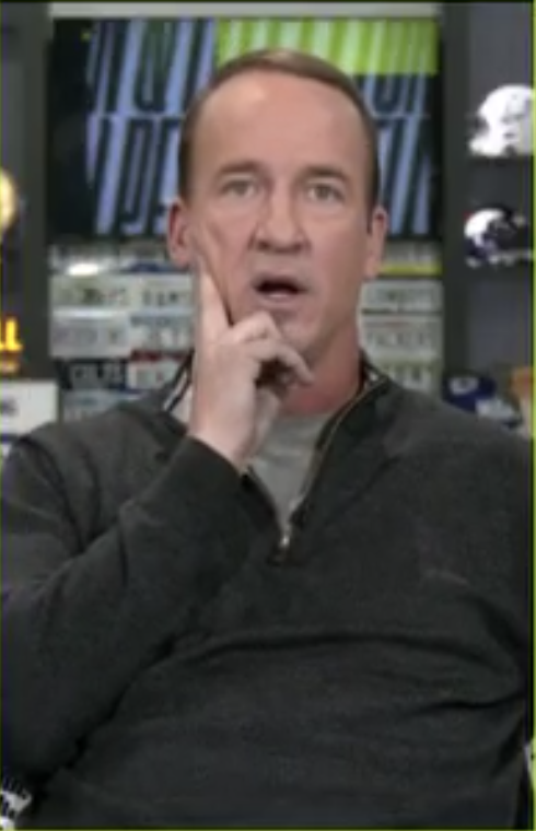 DKSports's tweet photo. What are the Mannings looking at? 

Wrong answers only. https://t.co/BJuutI8A4W
