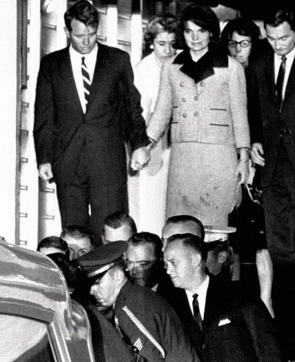 Closeup of Robert and Jacqueline Kennedy in her bloodstained suit (“Let them see what they have done”) leaving Air Force One, Andrews Air Force Base, tonight 1963:    #AP