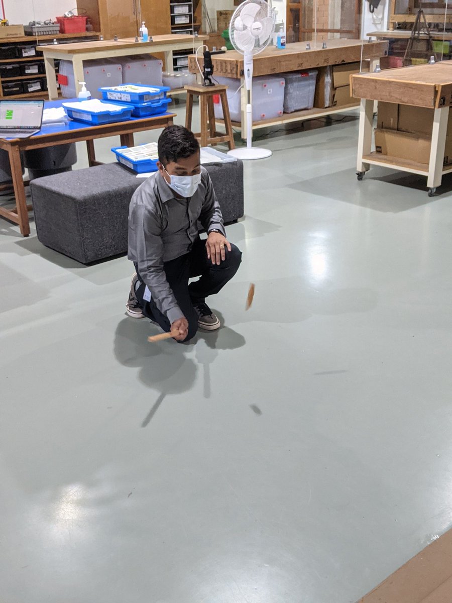 bindu_aisc's tweet photo. Our design teacher @ClintonFranswah demonstrating how to play gilli danda to  #AISCgrade2 students in #AISCIndianStudies class
 #AISCElementary @mathews_ram https://t.co/oNGxiCetCD