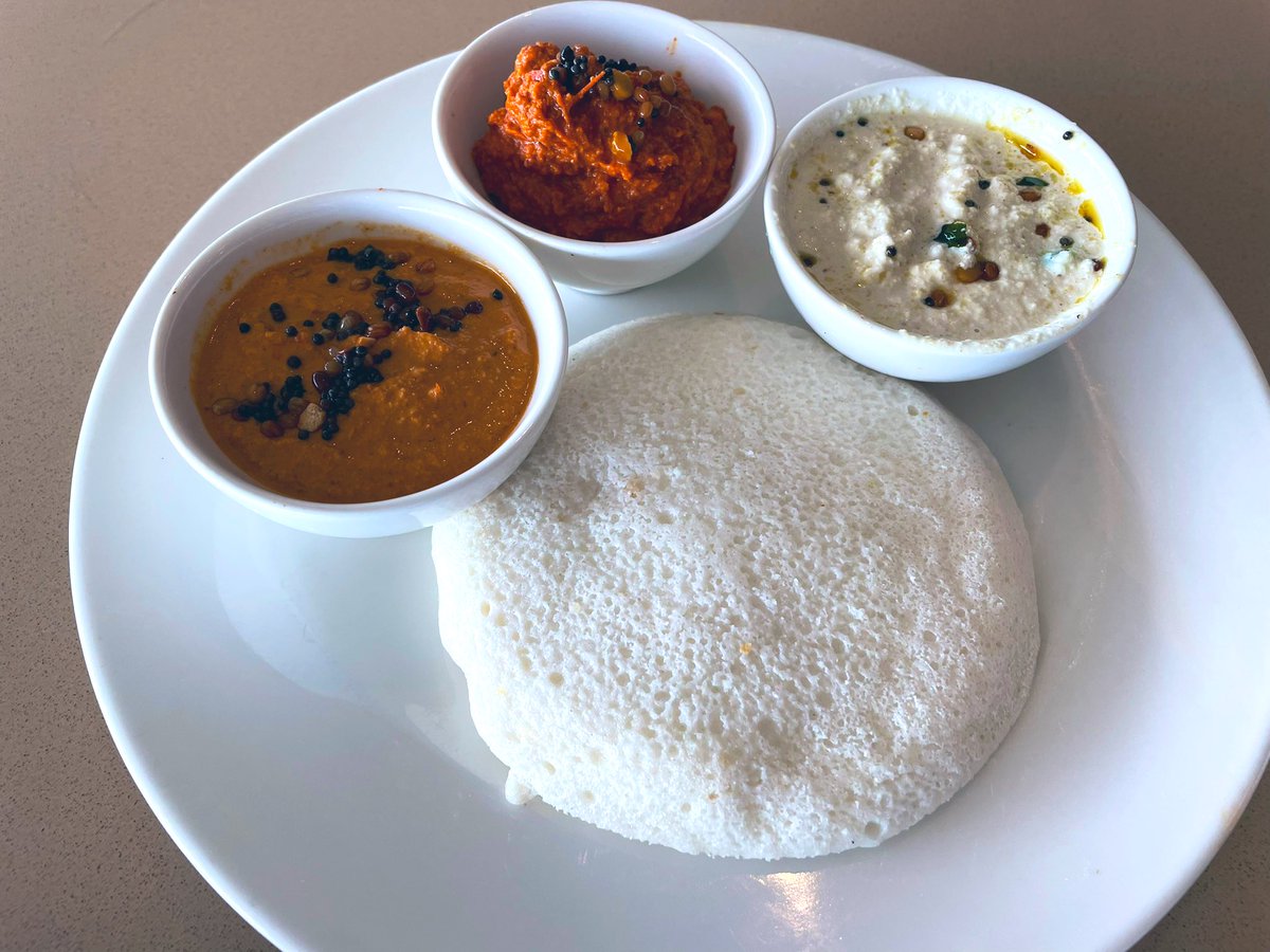 Chevane's tweet photo. Tried this pillowy soft #Thatte #Idli at The Square, Novotel Varun Beach, Vizag. Once you have this idli, you will not go back to the ordinary idli! While I was just waking up in my sleep T & Tracks, there walked in a wedding party bedecked in Kanjeevaram & gold!🤩✨ @Accor @All https://t.co/PHeRIcOFVG