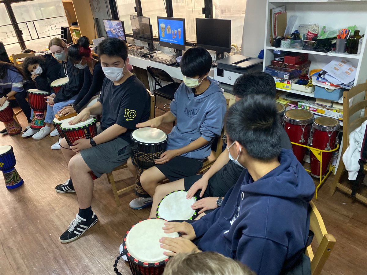 KimberlyW08's tweet photo. AIS students got into the groove of service learning today at The Africa Center HK! Thank you Innocent for teaching us all about African drumming! @OELPAIS @wing_mwing @aishongkong #FG2L2021 #OELP #UNSDs #Beyondtheredbricks https://t.co/LOCYm11Ngi