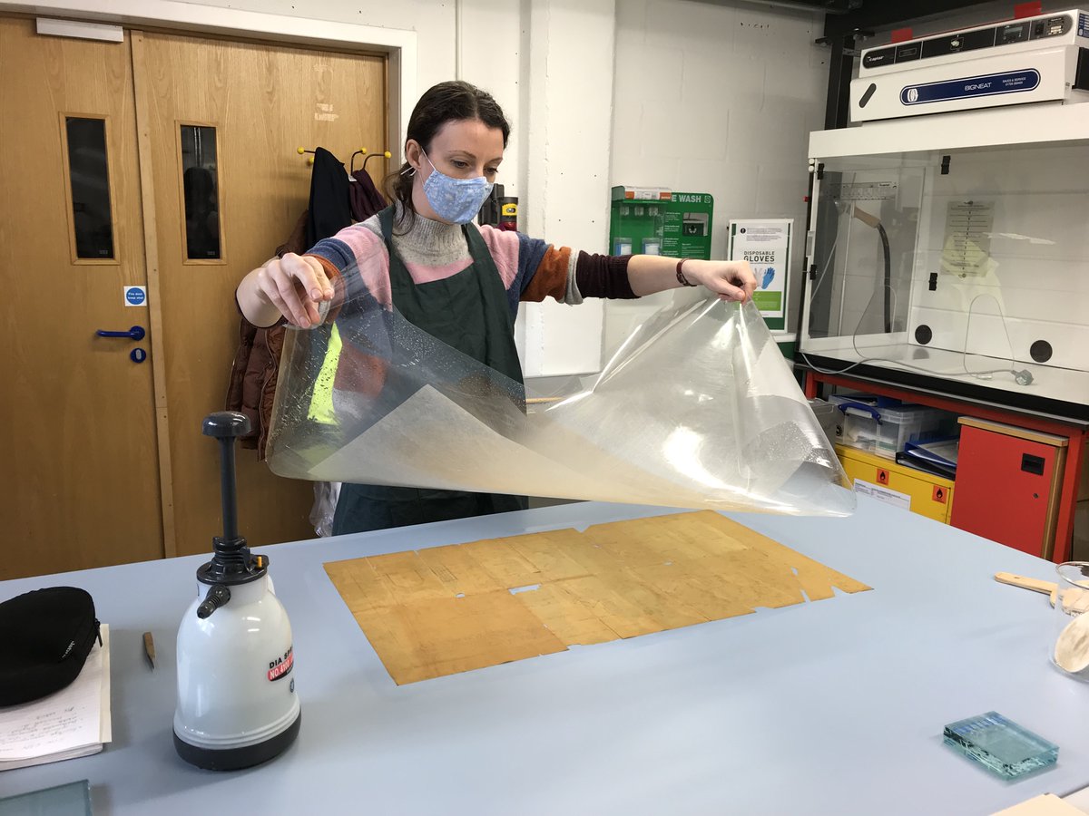 Tracing paper jigsaw day two. Aligning the fragments on a film of water before applying a lining of Japanese tissue with wheat starch paste. <a href="/HistEnvScot/">Historic Environment Scotland</a> #ExploreYourArchive #conservation