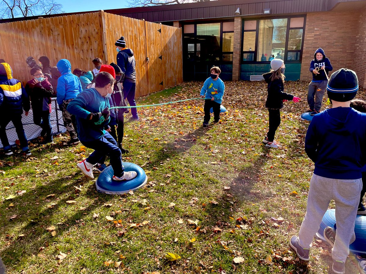 DMcWherterPE's tweet photo. We are having a great time in our stations. Students get full autonomy as they choose which activity they want to participate in. Shout out to @pe4everykid students loved the bosu battle! #StudentChoice #GaGaBall #BosuBattle #TirePull #bball #HulaHoops #FUN #PhysEd @Skokie735 https://t.co/dIcvuRma5d