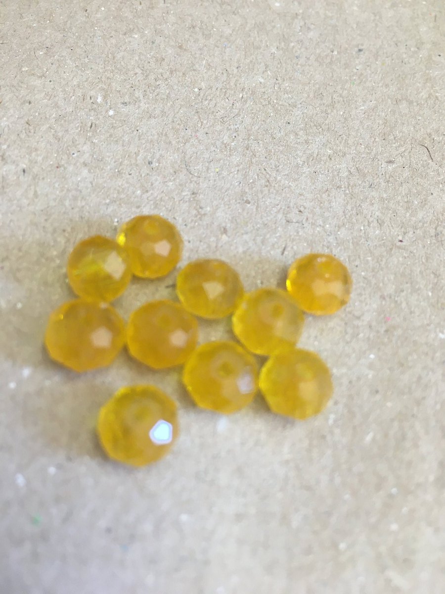 Excited to share this item from my #etsy shop: SALE 8mm Multi Faceted Opaque Centre Yellow Topaz Glass Rondelles pk 10 etsy.me/3DNfleX