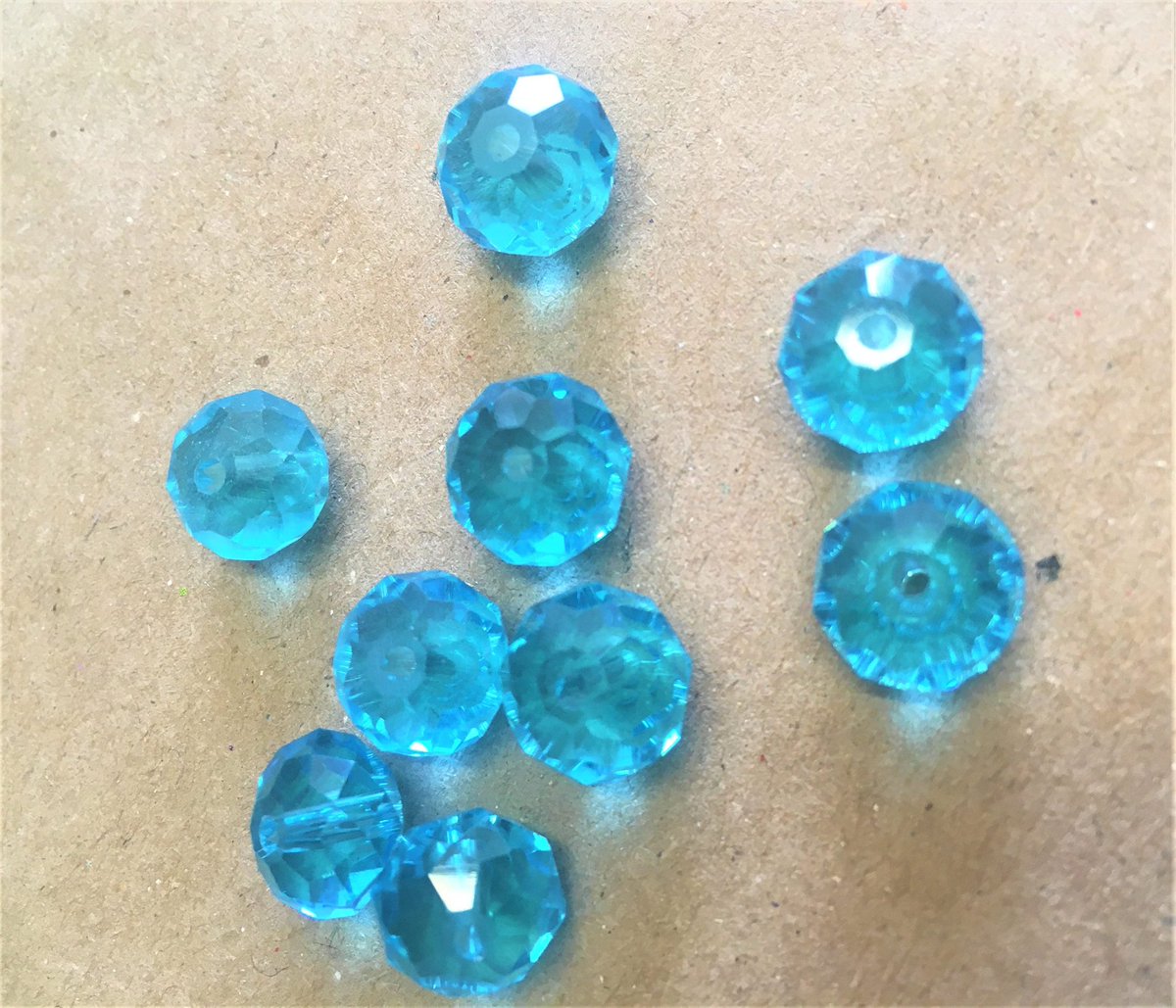 Excited to share this item from my #etsy shop: SALE Large 10mm Aquamarine Multi-Faceted Rondelles pk 9 £2.20 etsy.me/3l062Rq
