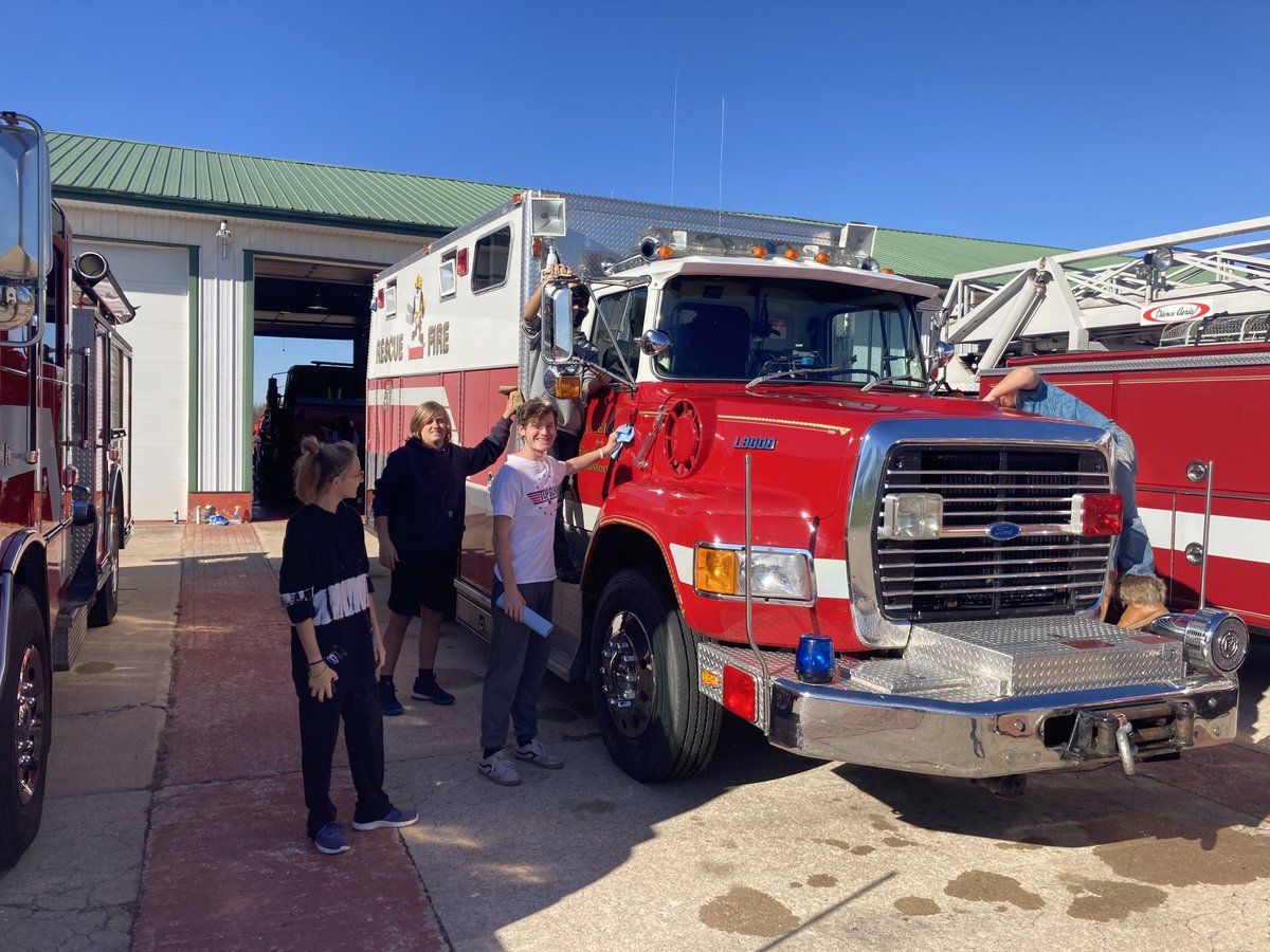 MVHS_AD's tweet photo. Coach Maberry and the MV students are shining up the trucks at the MVFD. #MtNeerServe https://t.co/OV07NQbEjl