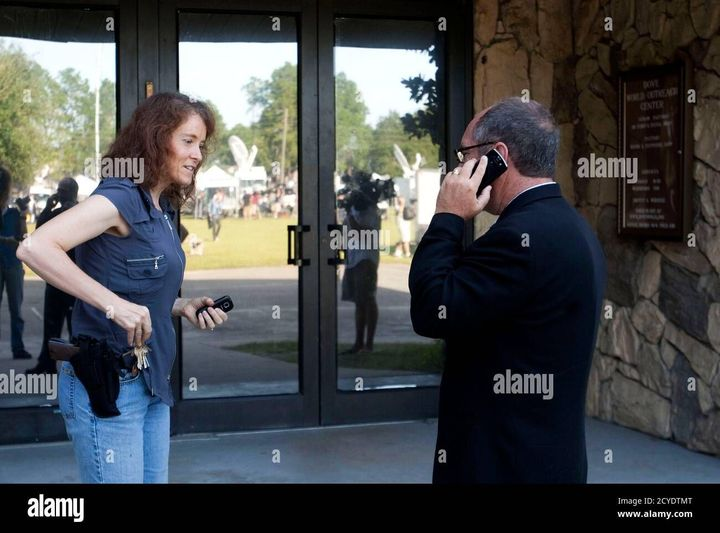 revmahoney's tweet photo. Not sure this is the warmest way to welcome church visitors. When I went to Dove World Outreach Center in Florida to persuade Pastor Terry Jones out of burning Qurans, I was greeted by an armed church member before I could get in! #WelcomeToOurChurch #MaybeAHandshake https://t.co/mzv4q3Y3IZ