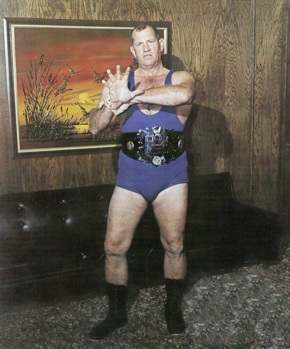 TracesofTexas's tweet photo. Famed wrestler Fritz von Erich shows off his signature move, The Iron Claw.  Fritz, whose real name was Jack Adksisson, was born in Jewett, Texas in 1929 and passed away in 1997. He was a 23-time world champion &amp; a record 20-time WCWA Champ. His sons followed him into the ring. https://t.co/emTrfDxnQJ