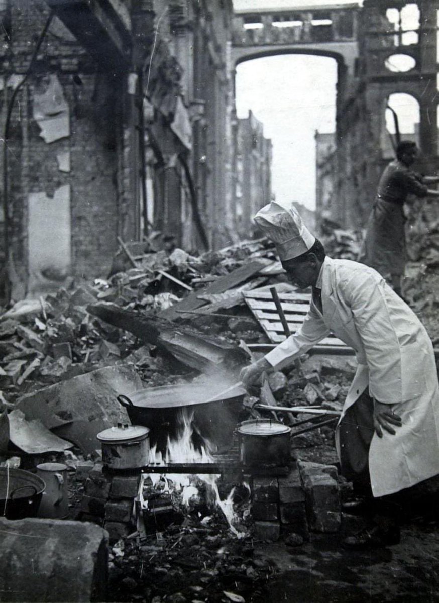Today marks 81 years since the beginning of the Bristol Blitz. A chef from the snack bar in Mary Le Port Street still cooking after the gas mains were destroyed. 📷 by Bristol photojournalist Jim Facey