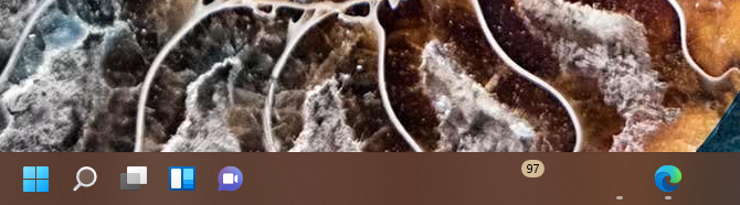 Is it too much to ask for the Windows 11 task bar to display icons?