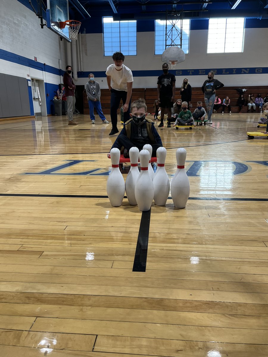 Some of our student teachers partnered with Coach Harris to plan a morning gym session to show us how strong our bodies can be. Slide tag and scooters! #SHSJrKnights #preschoollab #ECElearning