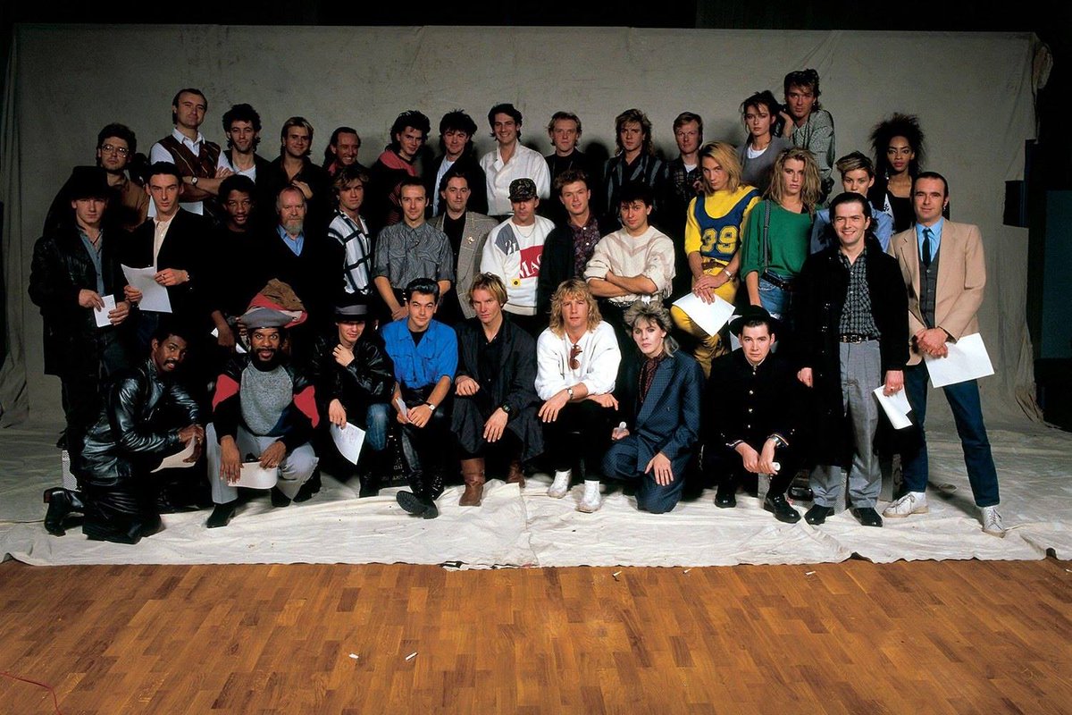 #OTD London, 1984. Everyone in this photo gathered together to record the Band Aid single 'Do They Know It's Christmas?'. Four days later it was released in the UK and is played all over the world at this time of year every year! We'll always remember it. bit.ly/2AgshwO