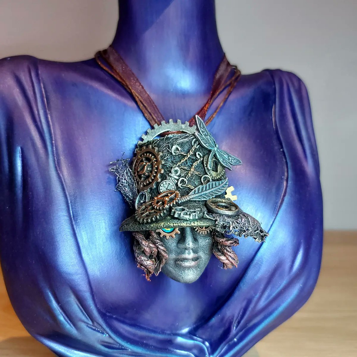 Theminimacabre's tweet photo. Decided to step away from witch hats and try something different. 
Wasn't sure at first but I'm actually really happy with it. 
#powertexuk #powertex #steampunk #steampunkjewellery #handcrafted #handpainted #uniquetalentday #smallbusinessuk #sculptedjewellery #statement #giftidea https://t.co/oJVFZ0apC8