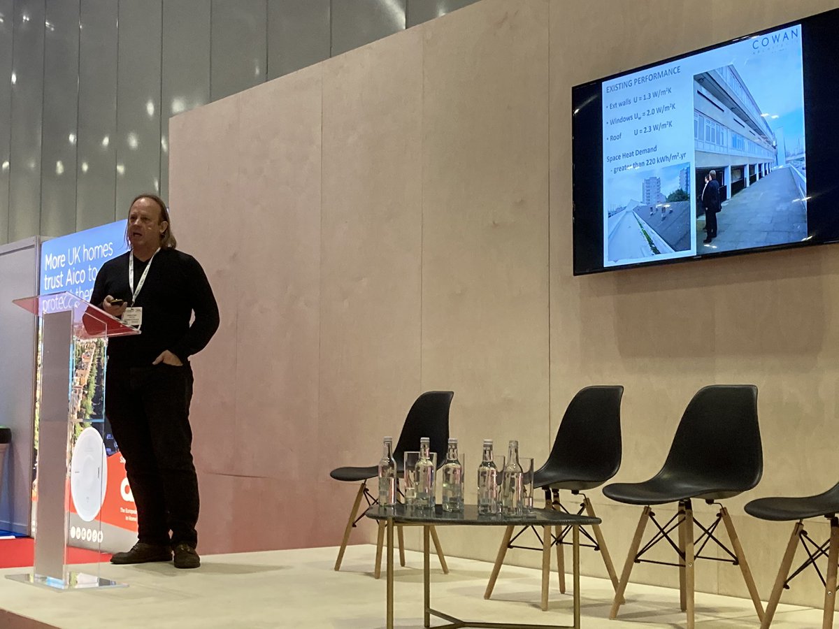 DollardTom's tweet photo. Now @mark_elton taking us through inspirational project - @PeabodyLDN retrofit of Thamesmead estate - only 4 days to install the pre-fab facade to Enerphit standard (200kwh down to 20kwh demand) #passivhaus #homesevent https://t.co/qKmRVyuNaq
