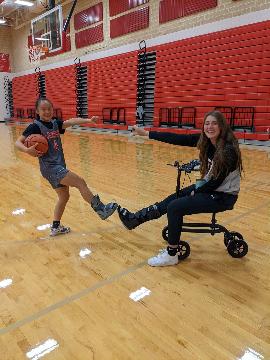 Cougarettebball's tweet photo. Unfortunately, we've had a couple of injuries this season. These two girls are still showing up for practice and cheering on their teammates. #bootbuddies @AthleticsCanyon @BMar1842 @canyonhscougars @e_skolaut @maddie_parham https://t.co/w4MEezgLV8