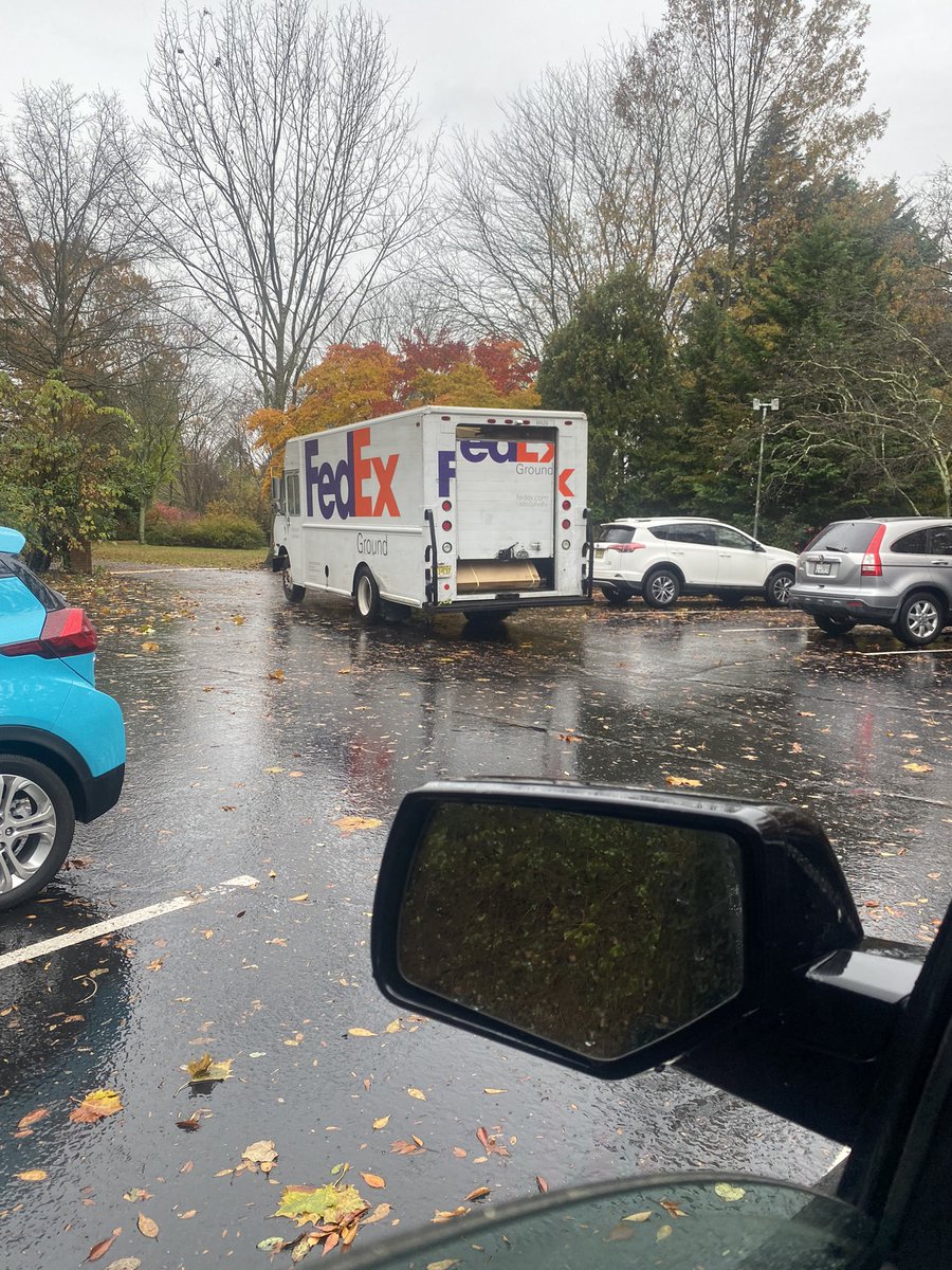 yasko's tweet photo. @FedEx You have a driver in NJ driving around with his truck open! https://t.co/uzh3oIHZes