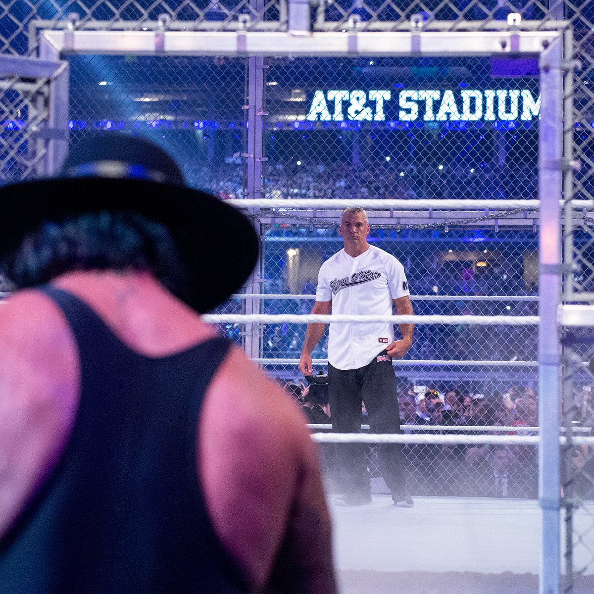 shanemcmahon's tweet photo. Cannot wait for @WWE’s return to @ATTStadium for TWO NIGHTS on April 2nd and 3rd! 
As a flashback, I was honored and privileged to perform in front of sold out crowd for #WrestleMania 32 with this man. @undertaker https://t.co/UAhpJrqHLf