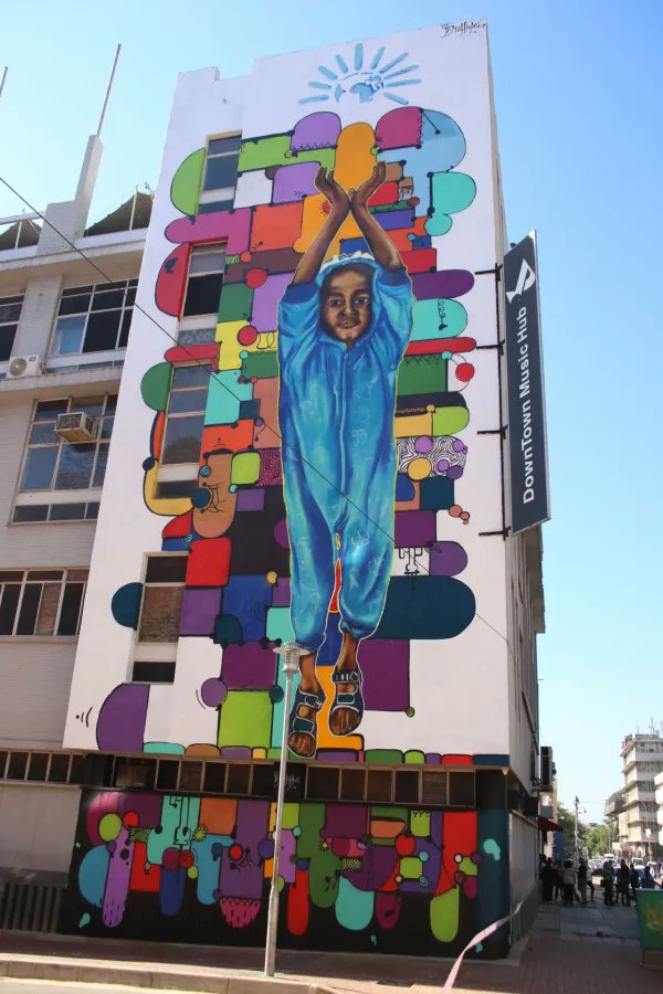 cartoonmovement's tweet photo. Yesterday, we unveiled our mural in Johannesburg, South Africa. A true co-creation, based on a sketch by @ZaheerSooliman, which inspired a cartoon by Osval from Cuba, turned into a mural by Ras Silas Motse: https://t.co/gZUX9v1A7U

#mural #SouthAfrica #Johannesburg #streetart https://t.co/AzMWxOYk7M