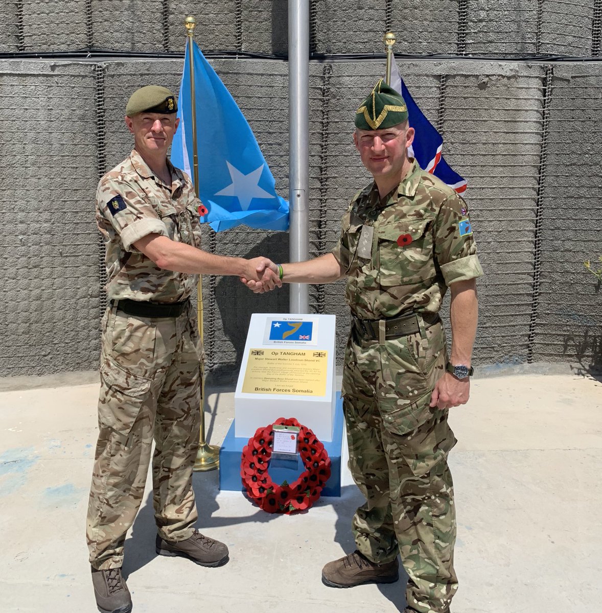 UKForcesSomalia's tweet photo. Remembrance Day in Somalia also marked the transition of Command from Colonel Mark Nooney MC to Colonel Alex Porter. We are honoured to have served alongside Colonel Mark over the last 12 months. Thank you for your service. 
 #Somalia https://t.co/4rpo26ioOu