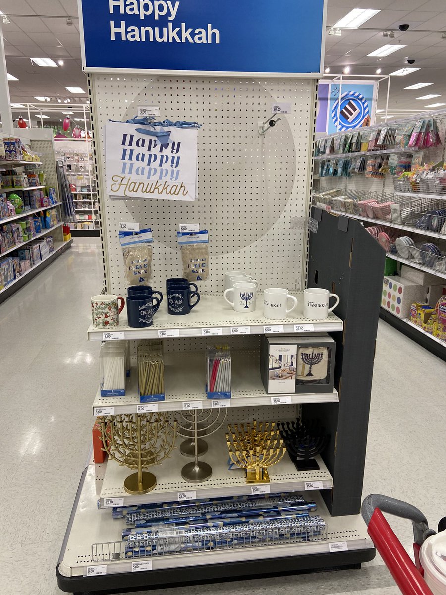 thenikkibaxley's tweet photo. Really @AskTarget this seems an acceptable homage to offer the Jewish population? And when I asked where the Hanukkah stuff might be the staffer replied “if we have that it’s only going to be a shelf”. I’m disgusted. https://t.co/ZDfbq8yWL0