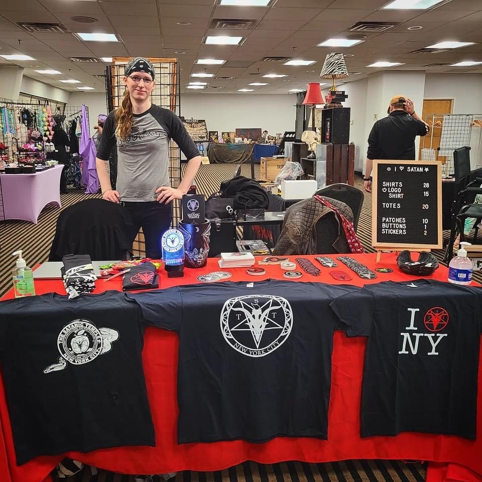 satanicnyc's tweet photo. In Woodbridge, NJ? At the Unconvention? Come say hello &amp; get your hands on some TST NYC merch! 

https://t.co/7ClqmCNi3J https://t.co/gAeeY6NNFX