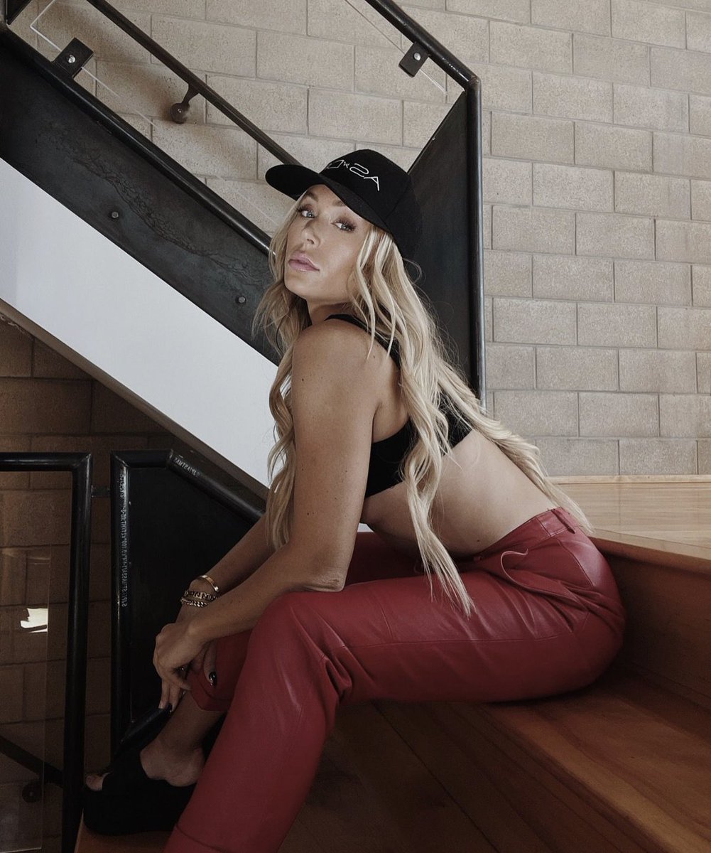 asbydf's tweet image. A red hot leather moment -  @megan__heaton styles the NEW Denise Recycled Leather Trousers w/ her exclusive #ASbyDF ball cap! Sold out online in red but now available to shop on @verishop ! #plasticfree