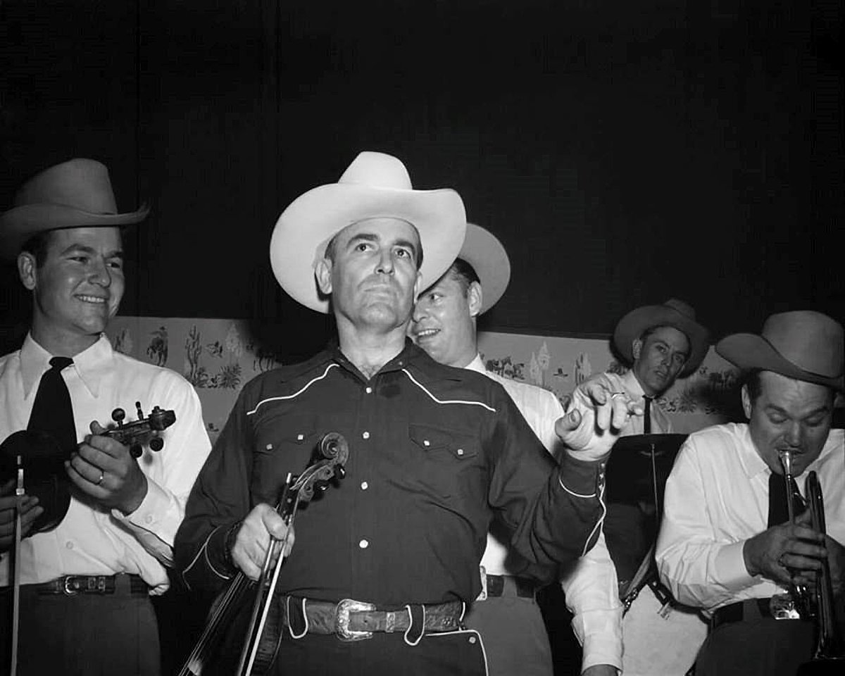 TracesofTexas's tweet photo. Last I checked, it's Friday afternoon.  And ----- last I checked ---- this is Texas.  Which means ---- last I checked ---- that BOB WILLS IS STILL THE KING! 😎 https://t.co/Mqysi3D0MW