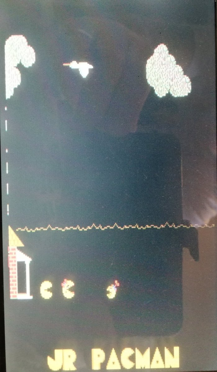 I'm always amazed at what arcade bootleggers do. Take a bootleg Pengo pcb, do a rom socket mod to make 24 pin sockets into 28 pin, add a daughter board with a billion flying wires that intercepts the tile generator to add horizontal scrolling and voila Pac man Jr.