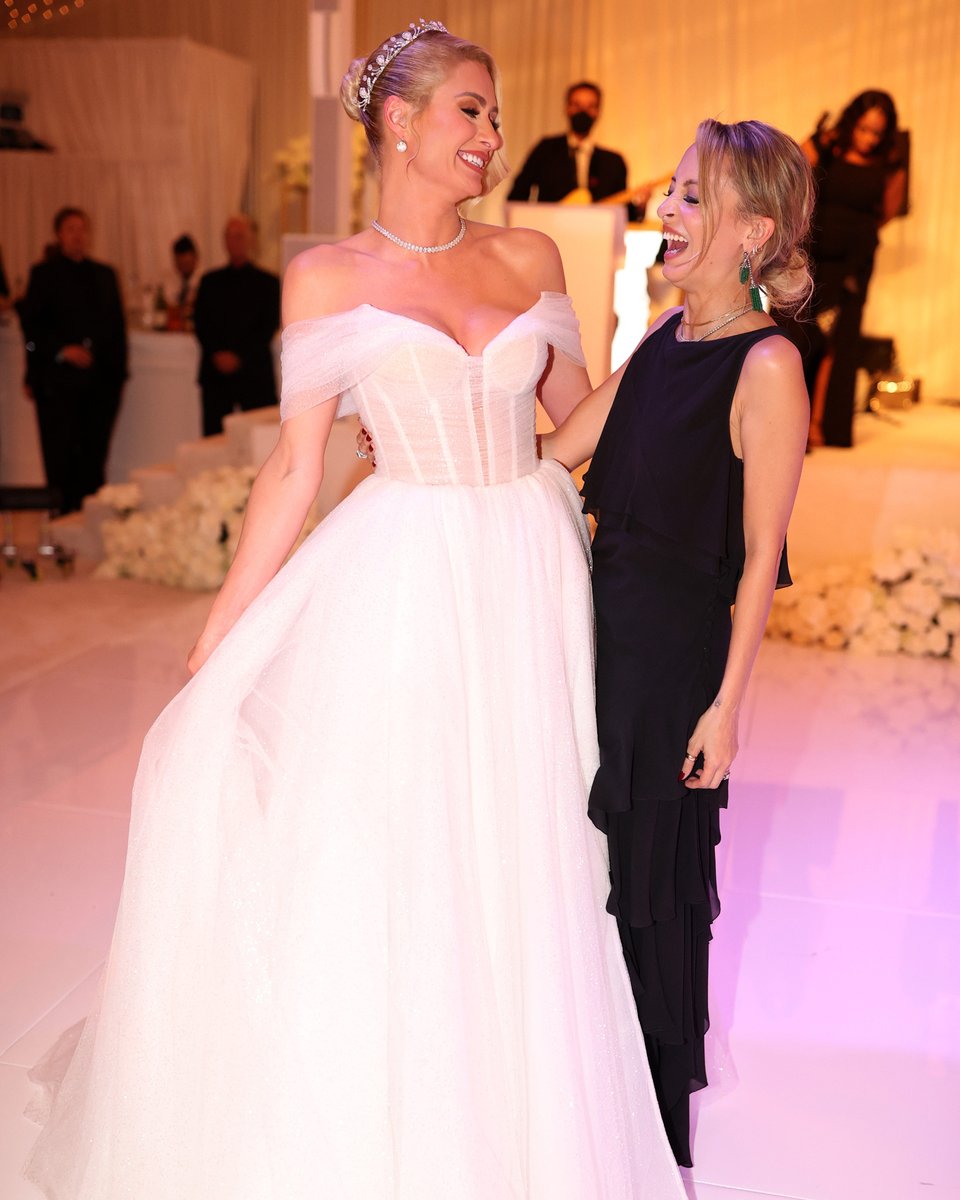 enews's tweet photo. Let's take two girls. Both filthy rich. From the bright lights. Into the sticks. From velvet robes. To cattle poles. Let's take away their limousines and hope they show up at each other's weddings. (📷: Christopher Polk/Shutterstock) https://t.co/mXx6hLMgRc