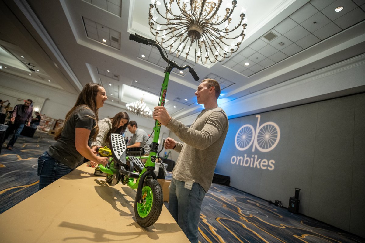 ReliaQuest's tweet photo. Our Tampa office came together to help build 400 Zikes 🏍, partnering with local org @onbikes_org. This was said to be the *record* amount of zikes (or bikes) built in just a little over 2 hours! Shout out 📣 to the RQ Tampa team and to helping those in need this holiday season. https://t.co/v7N1xudR3v