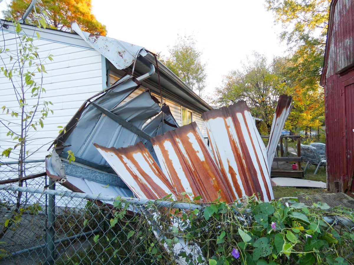 watsup_c's tweet photo. Tornado damage. Neighbor's shed lifted up over the corner of my yard into another neighbor's porch. Fortunately this is the worst damage we got. #oklahoma https://t.co/4ZemytDKZa