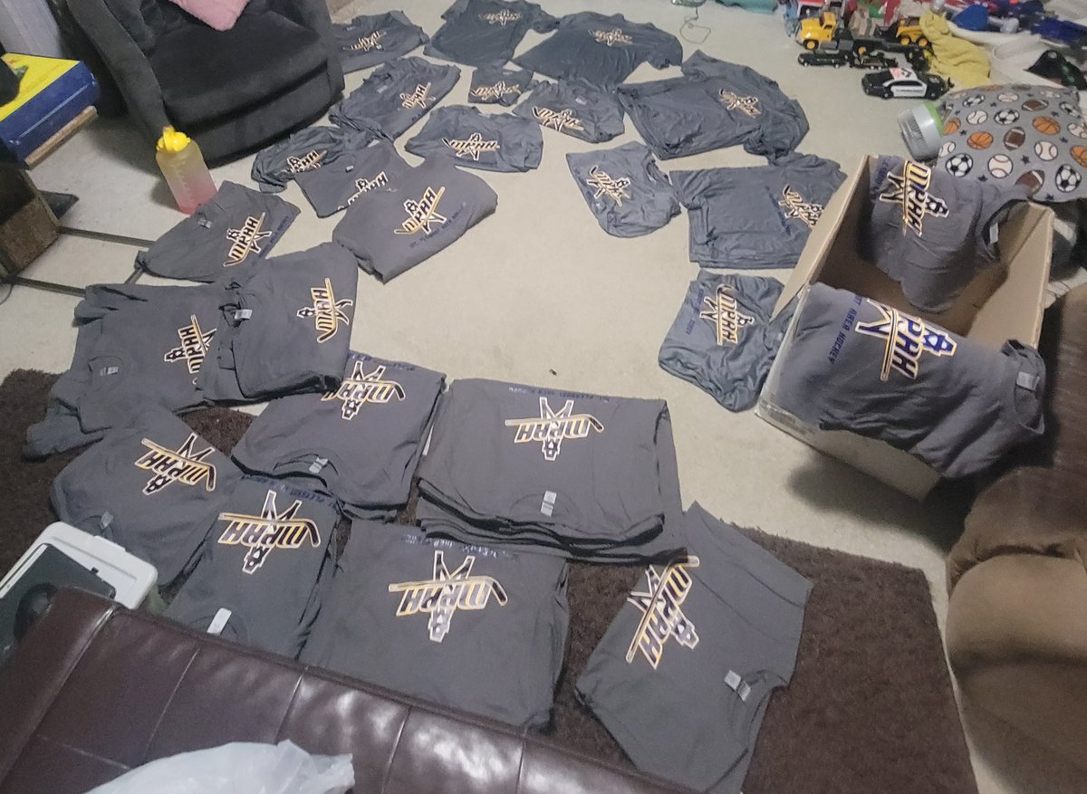 mpoilerhockey's tweet photo. Shirt, shirt, and more shirts! 8 more days until our season opener! 💙🏒💛 https://t.co/HWNFLdrnok