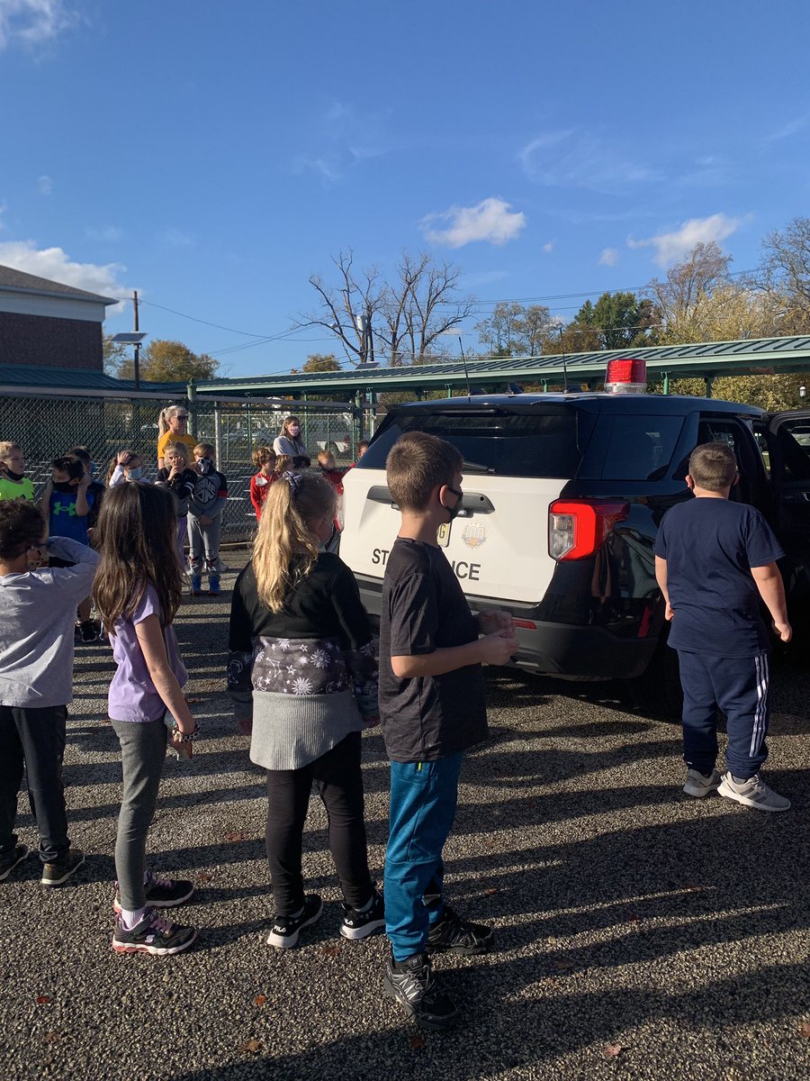 JHorner_CIA's tweet photo. School #1 and the State police both 100 years old this year. Today the state police stopped by to let the students see the replica car. What a wonderful surprise! @AvipMichael @STSchools_info #stswarriors #100years https://t.co/UzF9xm2RCL