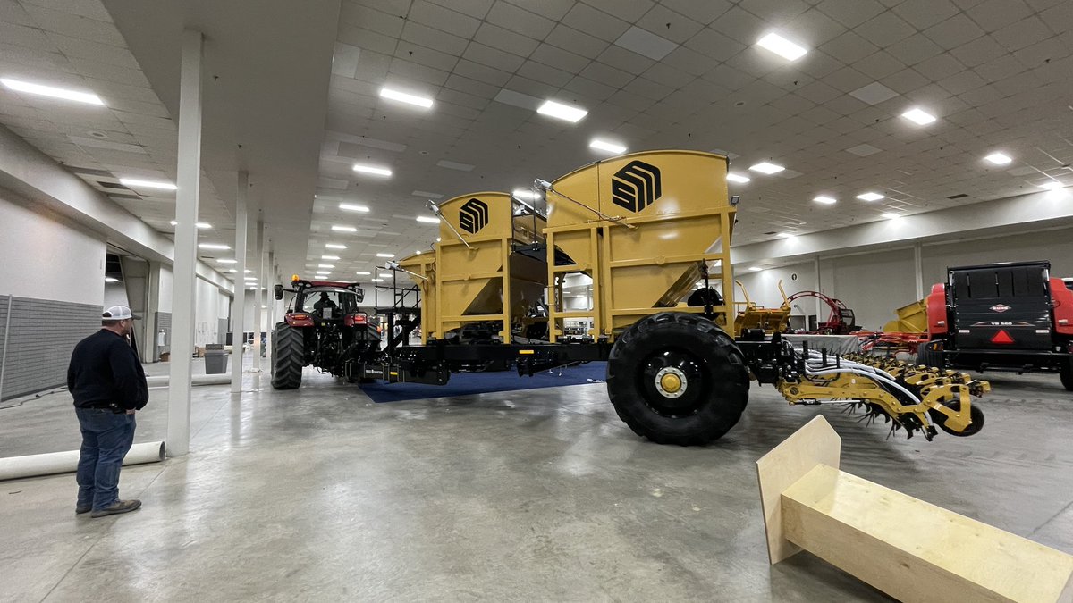SeedMasterMfg's tweet photo. There’s some fine driving going on here. Threading the needle from building to building to move the Ultra SR out. https://t.co/a9Yk3vQ6nc