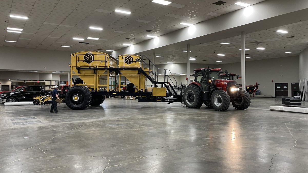 SeedMasterMfg's tweet photo. There’s some fine driving going on here. Threading the needle from building to building to move the Ultra SR out. https://t.co/a9Yk3vQ6nc