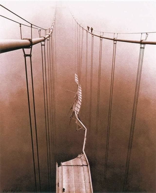 Archives_90s's tweet photo. View of the collapsed Tacoma Bridge from the height of the suspended cable system, 1940. https://t.co/FUQzb8SnW9