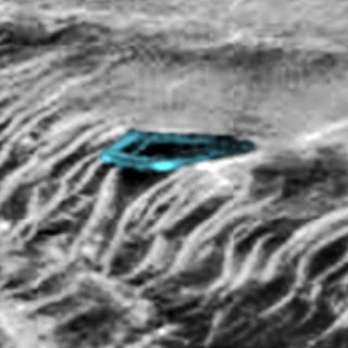 SecureTeam10's tweet photo. Here's what's been described as a half mile wide shiny metallic "disc" or alien base, complete with large dark windows wrapping around it, sitting on or embedded into the edge of a cliff on planet Mars.. The NASA image was discovered in 2015 by Scott Waring of UFO Sightings Daily https://t.co/PYYkZsaBFG