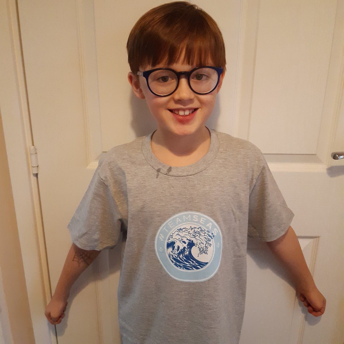 K_H_esq's tweet photo. The boy showing off his #TeamSeas @teamseas t-shirt after donating £5 of his pocket money 💰  #TeamHackney https://t.co/ADlAw1JQ3K