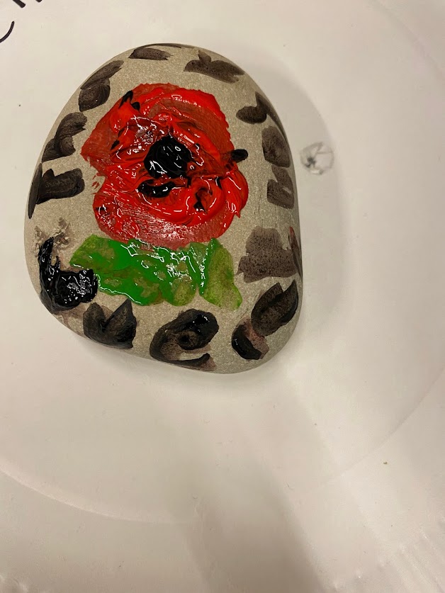 1stbeckenham's tweet photo. This Tuesday, the Cubs commemorated Remembrance Day. As part of the evening they decorated stones with poppies and messages. We also learnt about the contribution of Scouts to the war effort and decoded a message sent via semaphore. https://t.co/erqKrxNs1b