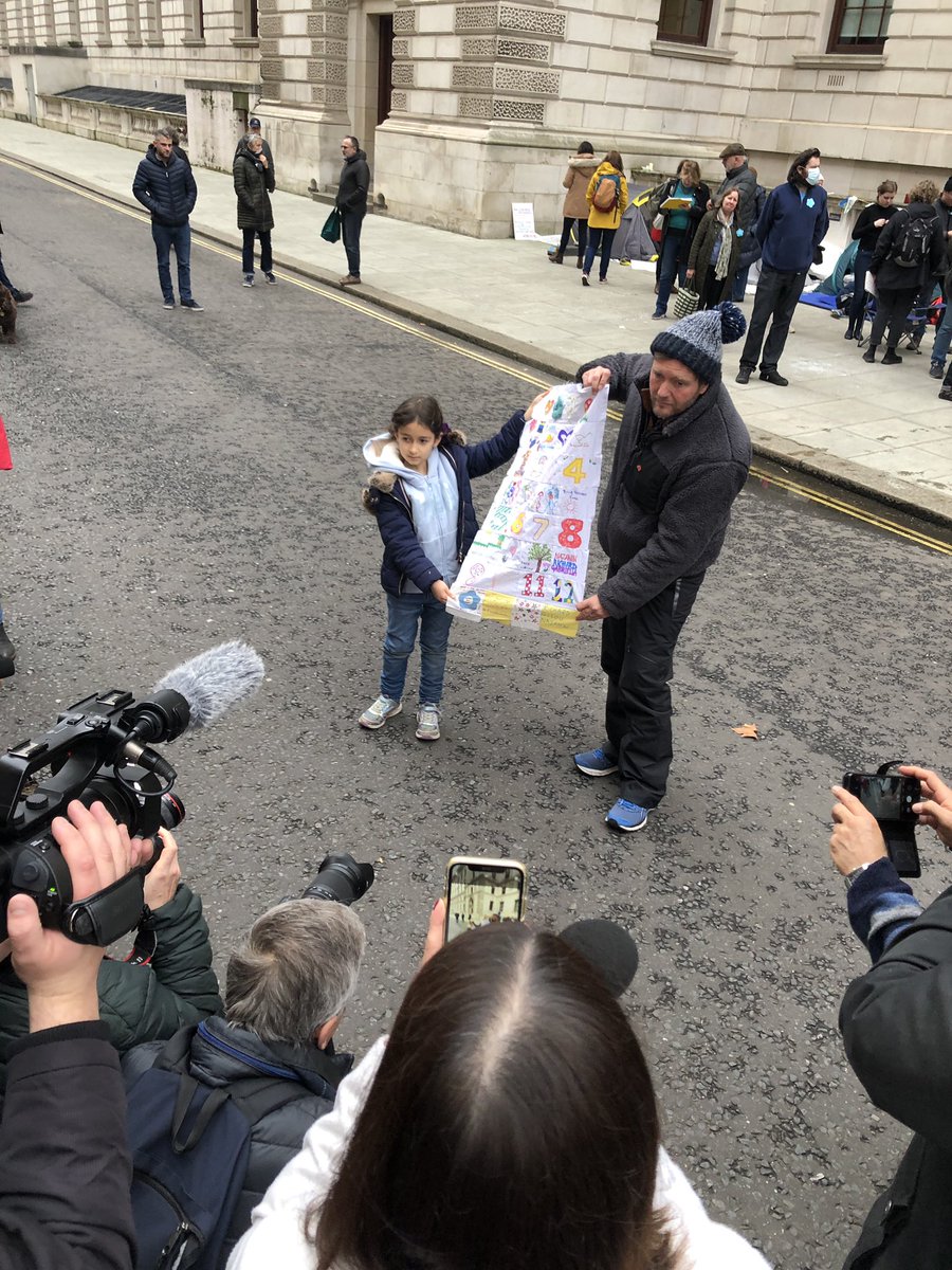 wyliecatherine's tweet photo. Richard Ratcliffe with his daughter Gabriella after he announced his decision to end his hunger strike which he began almost three weeks ago outside the Foreign, Commonwealth and Development Office in London. https://t.co/3dcAmGJLPp