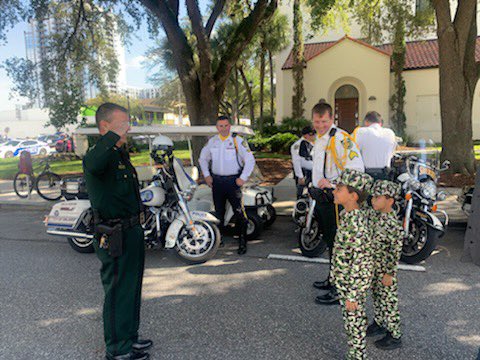 OrangeCoSheriff's tweet photo. We’re out with @SheriffMina and our deputies at the Veteran’s Day Parade honoring all those who have served in our great nation’s military. If you see them on the parade route say hello! https://t.co/96HTkFsX4Z