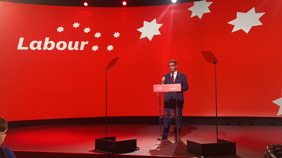 labour's tweet photo. “I’m a social democrat, and a proud Irishman who aspires to deliver a United Ireland but I know what comes first for me. 

Our biggest priority should be a #aNewDeal for housing, care, work and providing for your kids, whether you live in East Wall or East Belfast” #LP21 https://t.co/qb0RcHDIDI
