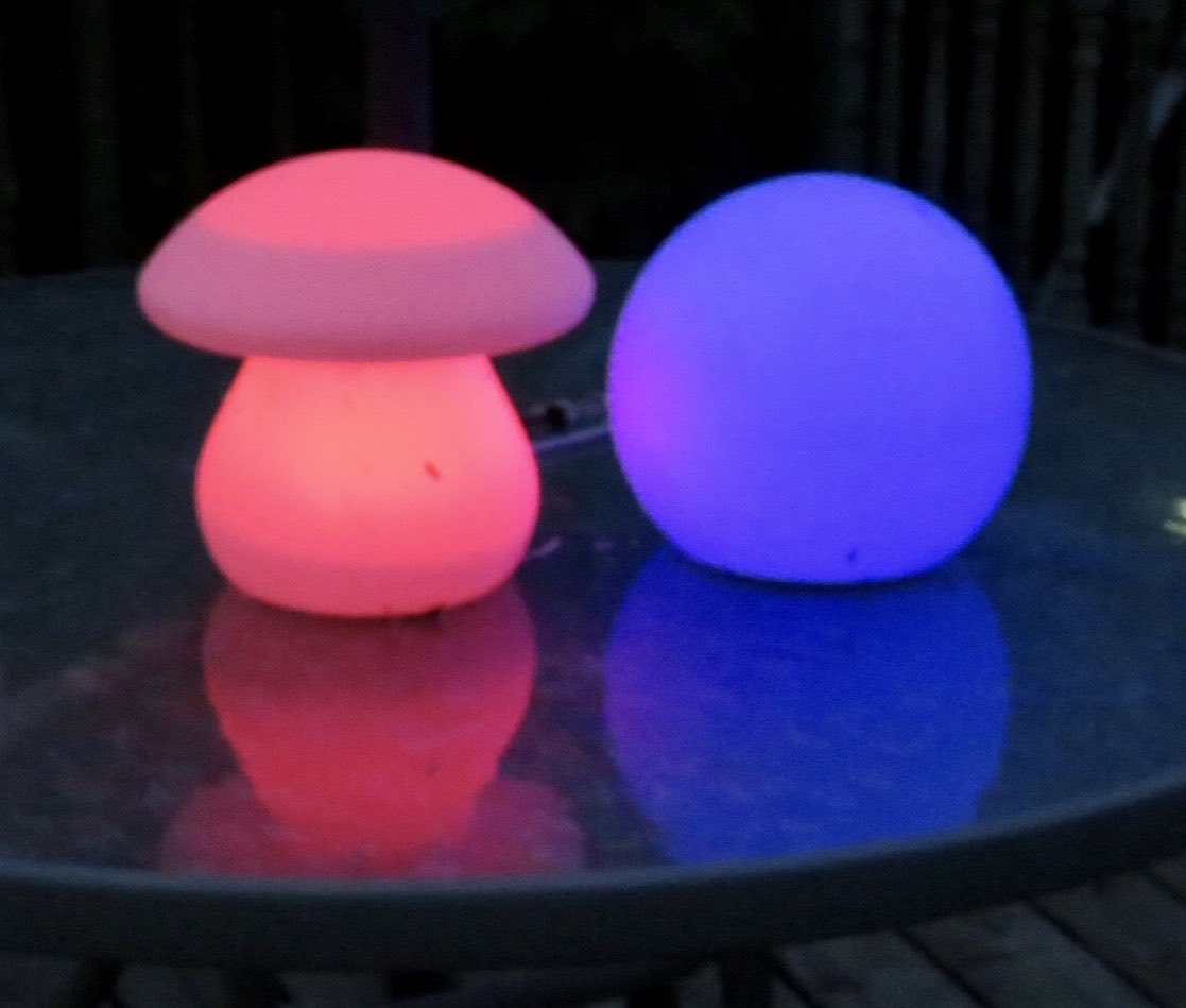 #HAPPINESS is the colorful glowing solar lights after dark that brighten up the yard. #solarlights #glowinglights #afterdark