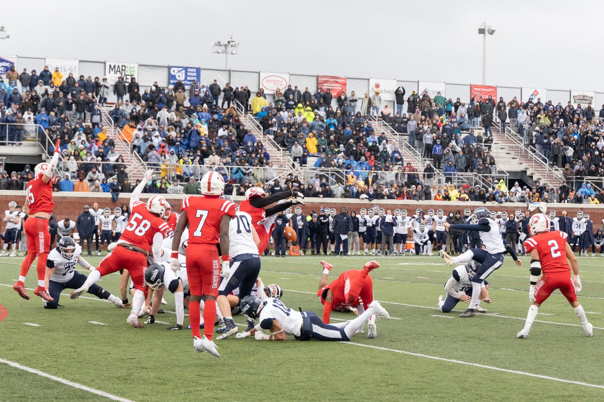 suny_cortland's tweet photo. The block -> and the reaction. Cortland blocked an Ithaca field goal with under 2:00 to play to seal a 28-27 victory in the Cortaca Jug game. Great game by the Red Dragons! https://t.co/ay2UjoU3iZ