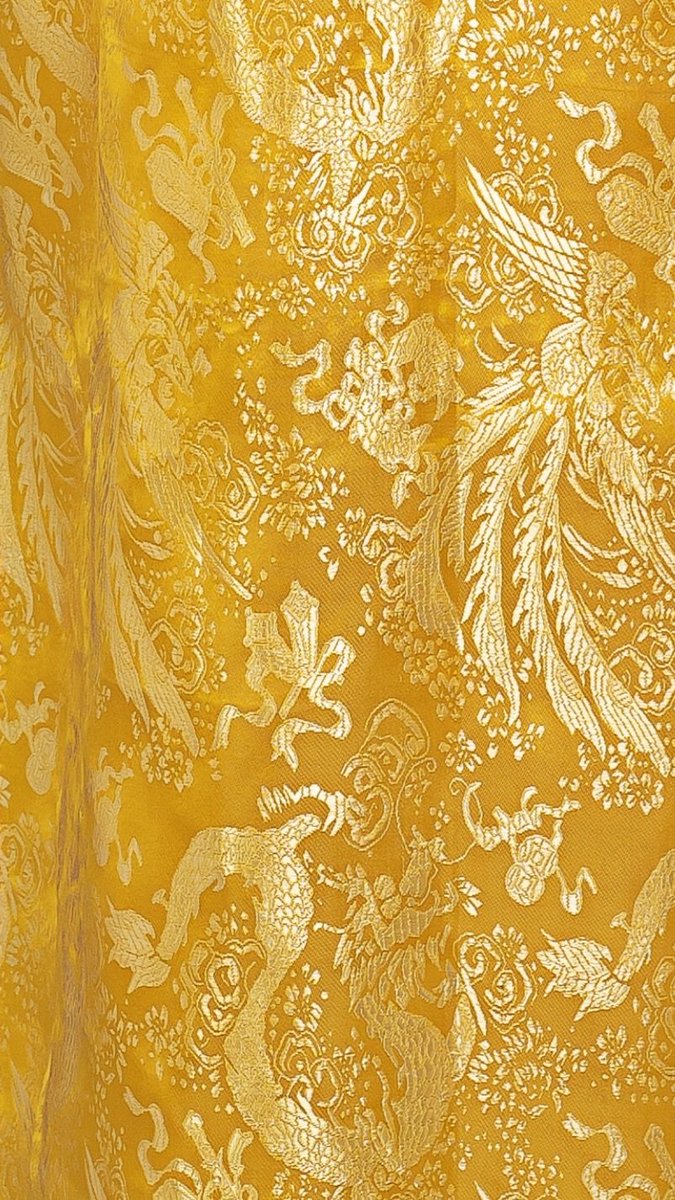 Love this phoenix &amp; dragon brocade fabric in yellow and gold. Talk about radiant! Traditionally the phoenix represented the empress and the dragon was the symbol of the emperor.
#aodai #vietnam #wedding #weddingdress #onlineshopping #marknvy